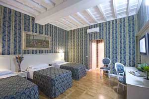 Superior triple with private facilities (shower), and breakfast